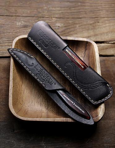 LEATHER COMB SLEEVE WITH MUSTACHE-BEARD COMB